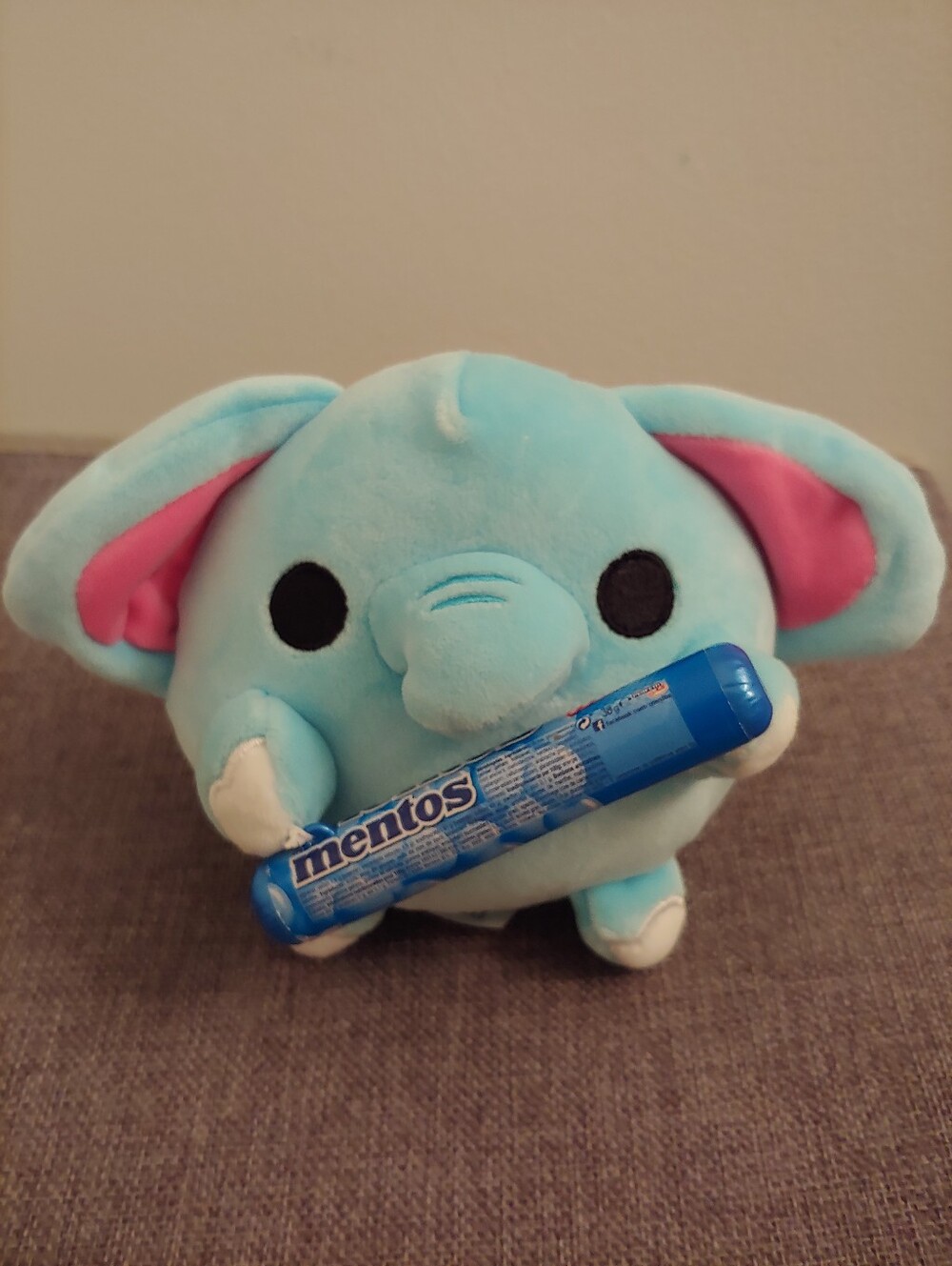 Blue Plush Elephant Holding Mentos Candy